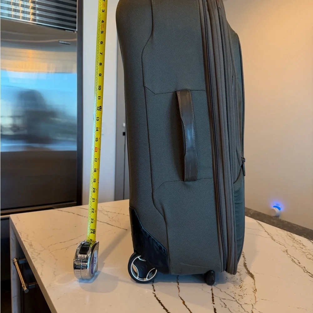 Tumi Brown Backpack with Multiple Compartments